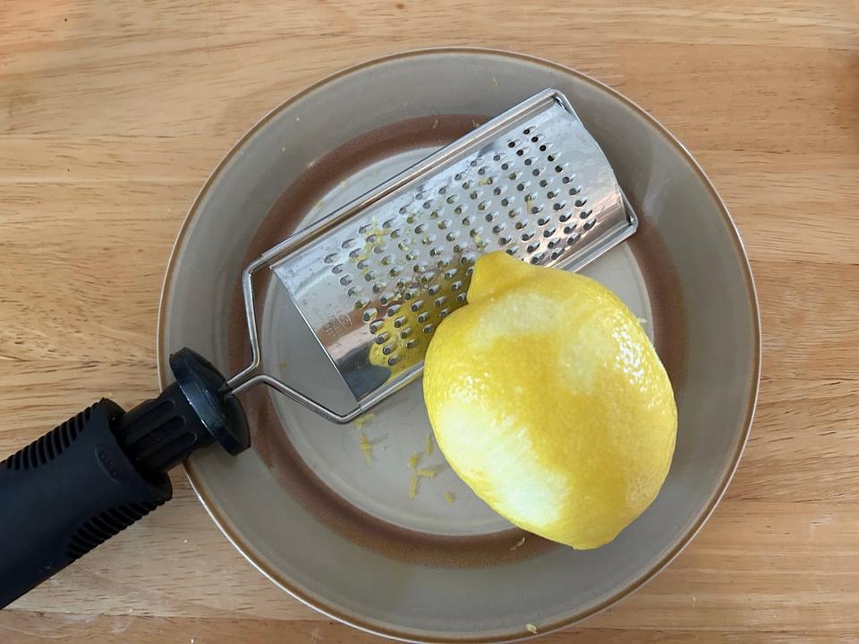 Zesting lemon for Ina Garten's Blueberry Ricotta Breakfast Cake