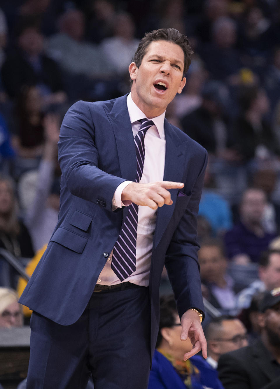 Sacramento Kings coach Luke Walton gestures during the first half of the team's NBA basketball game against the Memphis Grizzlies on Friday, Feb. 28, 2020, in Memphis, Tenn. (AP Photo/Nikki Boertman)