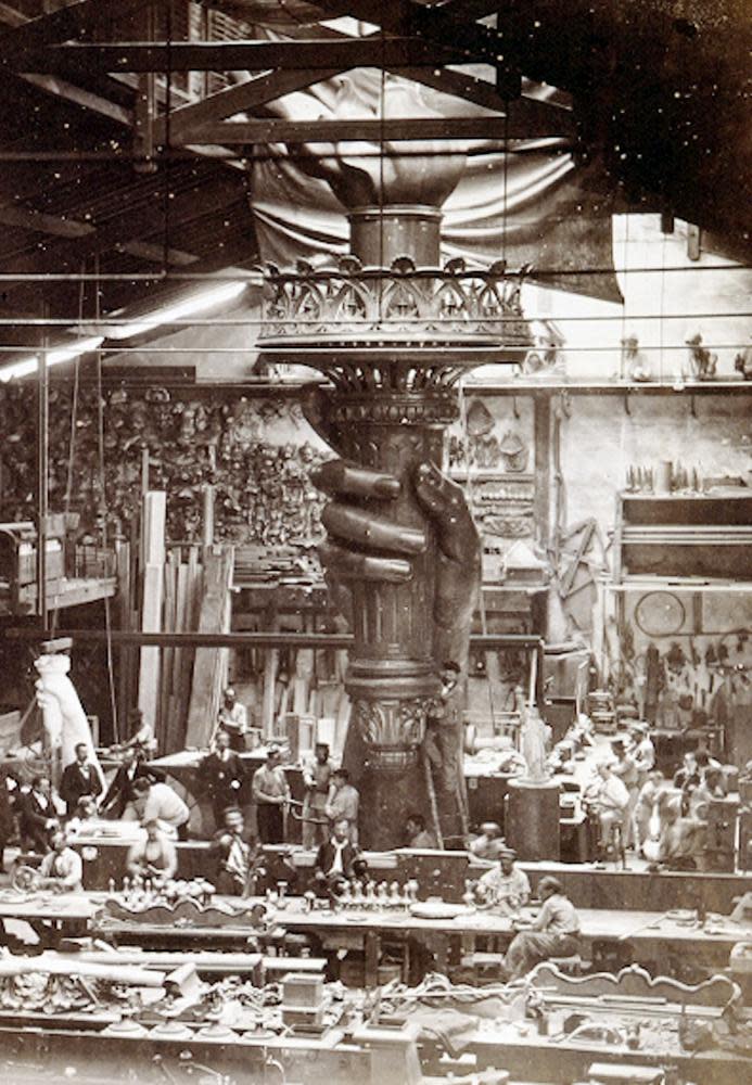 The Statue of Liberty designed by the French sculptor Frédéric August Bartholdi under construction at a Paris studio around 1876.