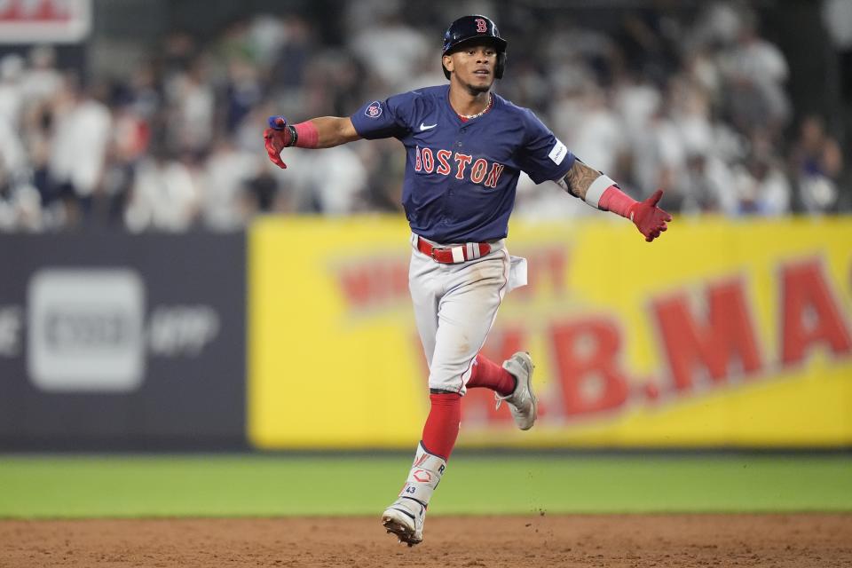 Boston Red Sox's Ceddanne Rafaela gestures toward teammates as he runs the bases after hitting a two-run home run during the 10th inning of a baseball game against the New York Yankees, Friday, July 5, 2024, in New York. (AP Photo/Frank Franklin II)