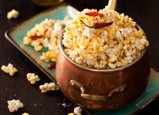 <strong>Get the <a href="http://www.melangery.com/2012/07/garlic-popcorn-with-cayenne-pepper-and.html" target="_hplink">Garlic Popcorn with Cayenne Pepper recipe</a> by Cooking Melangery</strong>    Cayenne pepper adds a lot of spice so use it sparingly. But this spicy popcorn is nicely paired alongside a cold beer.