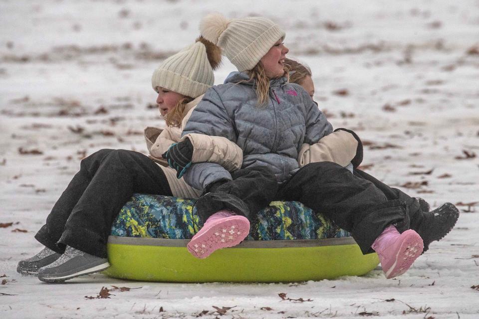 Children practice sledding in the near 3 inches of snow dropped in Rockwood Park since yesterday in Wilmington, Tuesday, Jan. 16, 2024.