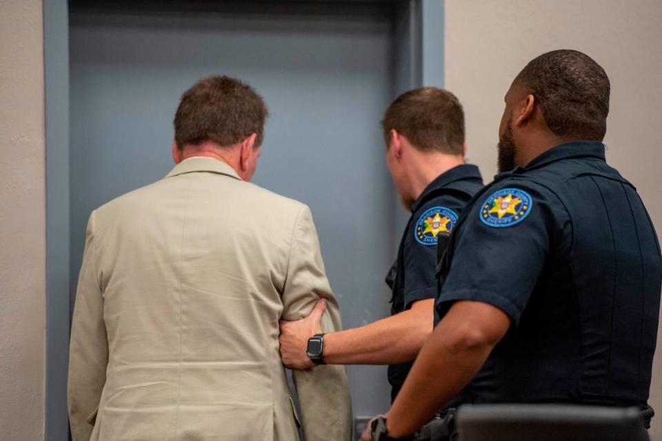 Cliff Kirkland is led away by the Harrison County Sheriffs Department after being found guilty on all charges by the jury during a trial of Kirkland for sexual abuse charges at Harrison County Circuit Court in Biloxi on Wednesday, May 18, 2022. Kirkland was sentenced to 35 years in prison.