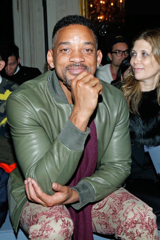 Actor Will Smith attends the Valentino's men's Fall-Winter 2014-2015 fashion collection, presented Wednesday, Jan. 15, 2014 in Paris. (AP Photo/Jacques Brinon)