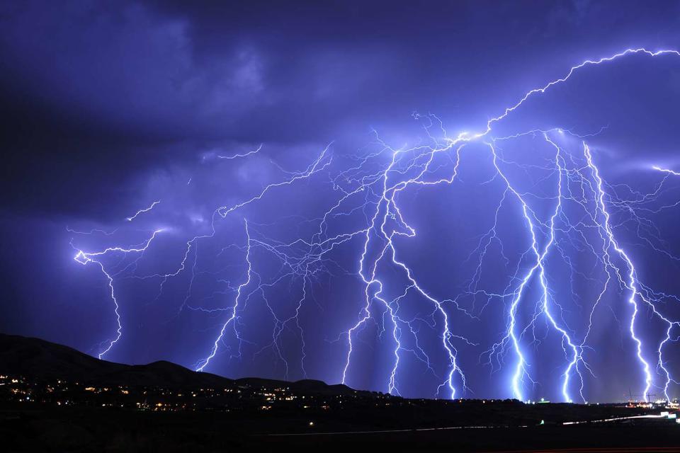 <p>Getty</p> A lightning storm in Utah