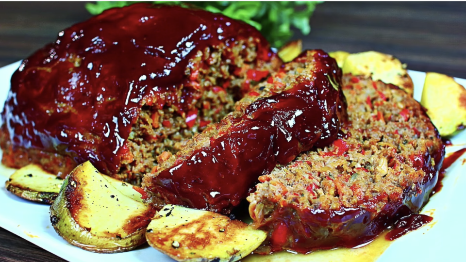 Plate of meatloaf with a tomato-and-molasses sauce