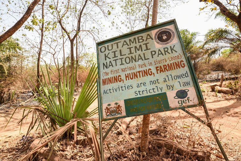 A signboard welcomes visitors to the Outamba-Kilimi national park in northern