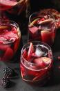 <p>Looks like blood, tastes like a party.</p><p>Get the recipe from <a href="https://domesticate-me.com/autumn-sangria-apples-pomegranate-blackberries/" rel="nofollow noopener" target="_blank" data-ylk="slk:Domesticate Me;elm:context_link;itc:0;sec:content-canvas" class="link ">Domesticate Me</a>.</p>