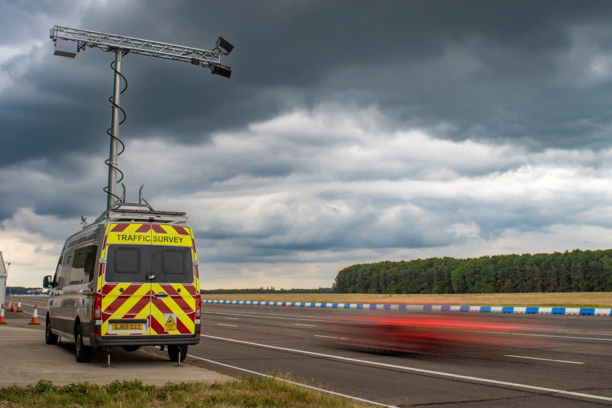 Drivers are being filmed to catch those holding a mobile phone or not wearing a seatbelt (National Highways/PA)