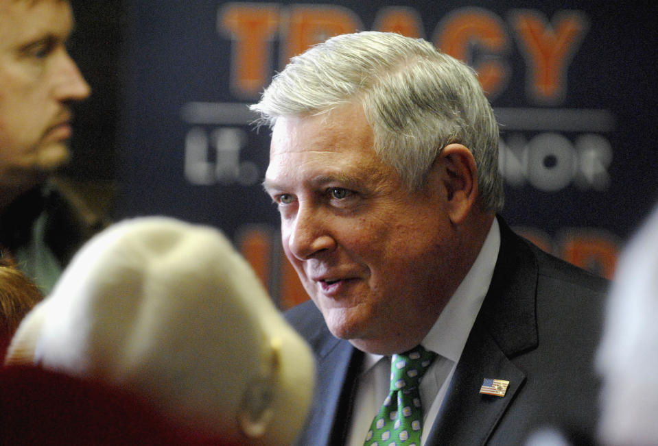 Republican gubernatorial candidate, Illinois state Sen. Kirk Dillard, of Hinsdale, talks with supporters after a campaign visit to the Williamson County Regional Airport in Marion, Ill., Monday, March 17, 2014. Dillard, his running mate Jill Tracy and former Gov. Jim Edgar have been flying across the state in advance of the primary election Tuesday. (AP Photo/The Southern, Adam Testa)