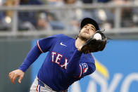 Texas Rangers third baseman Josh Smith catches a popup from Kansas City Royals' MJ Melendez during the third inning of a baseball game in Kansas City, Mo., Saturday, May 4, 2024. (AP Photo/Colin E. Braley)