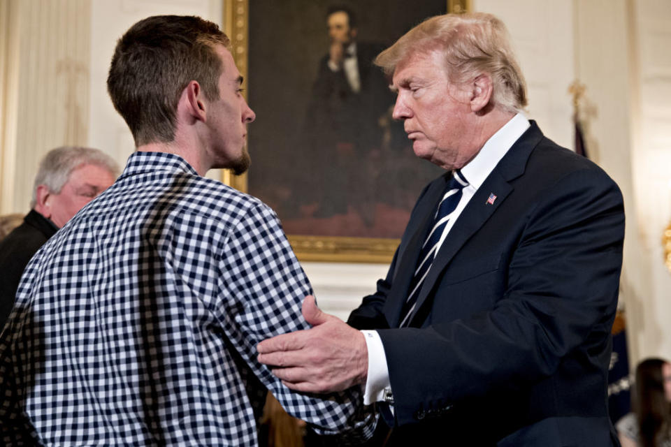 President Trump greets Samuel Zeif, a Marjory Stoneman Douglas High School student. (Photo: Andrew Harrer/Bloomberg)