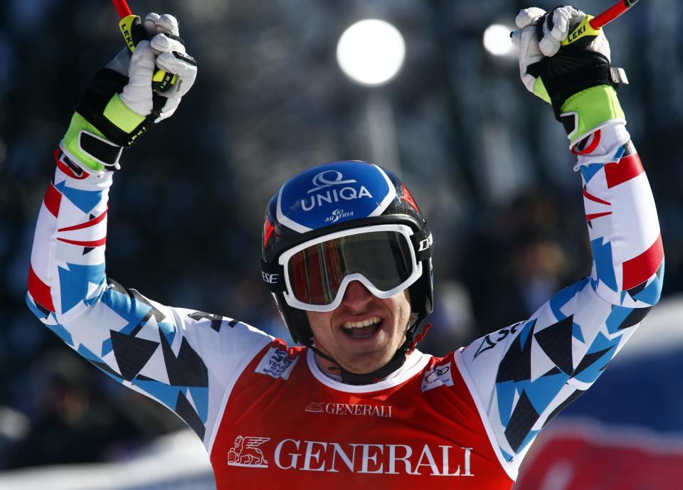 Austria's Matthias Mayer celebrates at the finish area of an alpine ski, men's World Cup Super G, in Kitzbuehel, Austria, Friday, Jan. 20, 2017. (AP Photo/Giovanni Auletta)