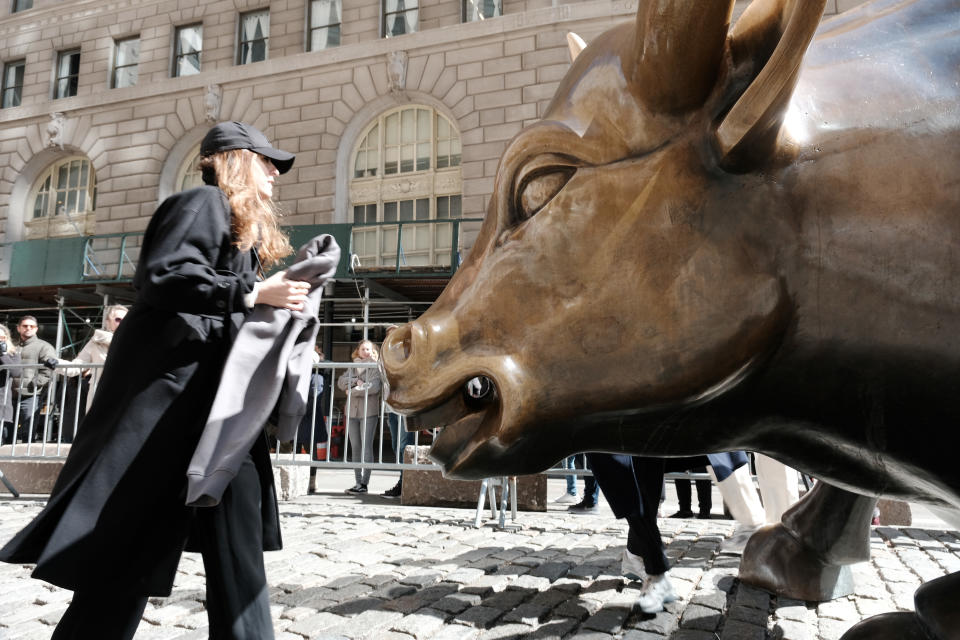 NEW YORK, NEW YORK - MARCH 07: People walk by Wall Street Bull in the Financial District on March 07, 2023 in New York City. Stocks fell in early trading on Tuesday after comments from Federal Reserve Chair Jerome Powell suggested that interest rates may need to go higher to fight inflation. (Photo by Spencer Platt/Getty Images)