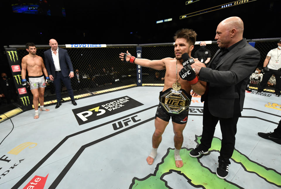 JACKSONVILLE, FLORIDA - MAY 09: Henry Cejudo announces his retirement in the Octagon after his victory over Dominick Cruz in their UFC bantamweight championship fight during the UFC 249 event at VyStar Veterans Memorial Arena on May 09, 2020 in Jacksonville, Florida. (Photo by Jeff Bottari/Zuffa LLC)