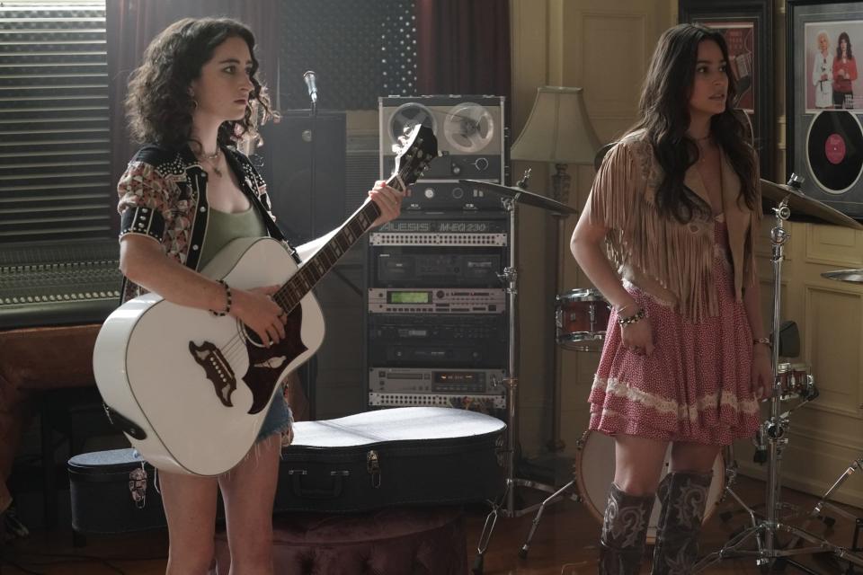 Abby Quinn (left) and Alexxis Lemire star as Jordan and Leigh in Blumhouse country music thriller "Torn Hearts."