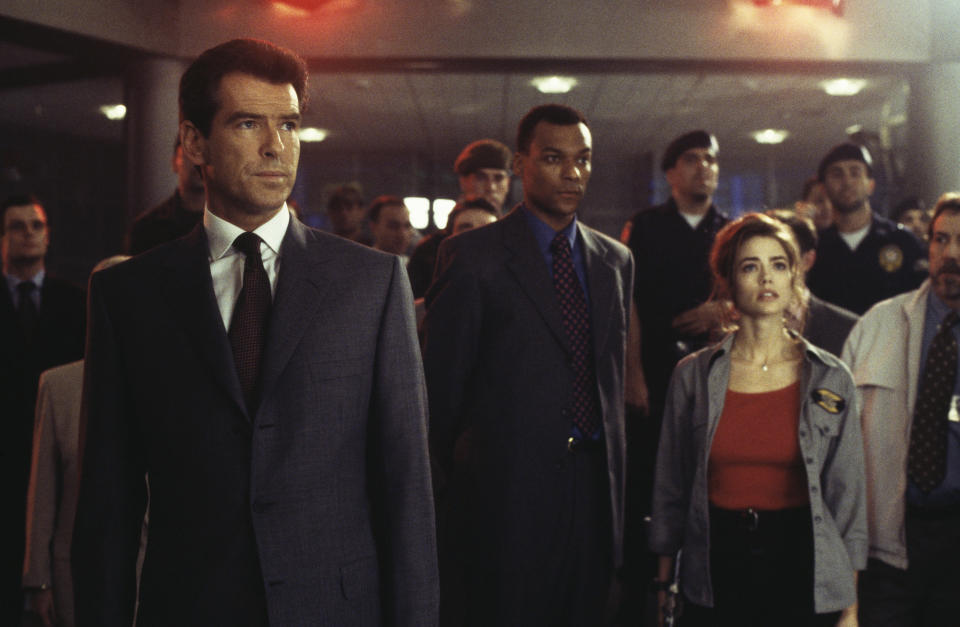 From left to right, Irish actor Pierce Brosnan as 007, English actor Colin Salmon as Charles Robinson and American actress Denise Richards as Dr Christmas Jones in a scene from the James Bond film 'The World Is Not Enough', 1999. (Photo by Keith Hamshere/Getty Images) 