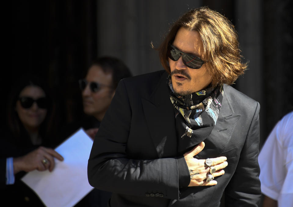 Actor Johnny Depp arrives at the High Court, in London, Monday July 20, 2020. Amber Heard started Monday to give evidence at the High Court in London as part of Johnny Depp’s libel case against The Sun over allegations of domestic violence during the couple's relationship. (AP Photo/Alberto Pezzali)