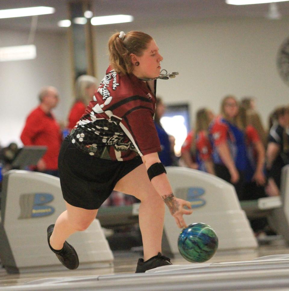 Newark's Jade Gabor bowls against Pickerington Central on Thursday.