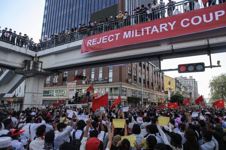 Protesters take part in a demonstration against the military coup in Yangon on Feb. 10. (Photo: STR via Getty Images)