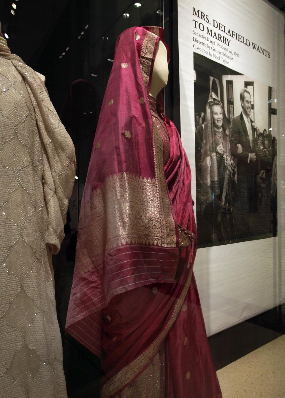 Designs by Noel Taylor, from the 1986 television movie "Mrs. Delafield Wants to Marry," are shown as part of the "Katharine Hepburn: Dressed for Stage and Screen" exhibit in the New York Public Library for the Performing Arts at Lincoln Center, Tuesday, Oct. 16, 2012. (AP Photo/Richard Drew)