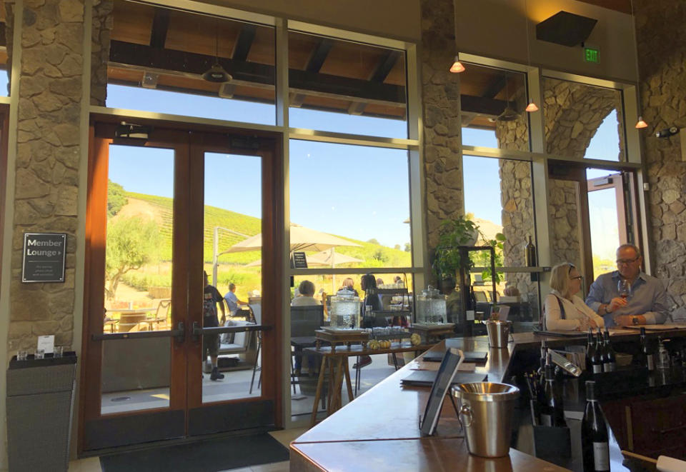 This Oct. 13, 2019 photo shows the tasting room at Nine Wine Estates in Paso Robles, Calif. Winemakers around this central California city can grow a mind-boggling variety of grapes thanks to a wide diversity of microclimates. The wine-growing area around Paso Robles is nearly three times the size of Napa Valley. (AP Photo/Sally Carpenter Hale)