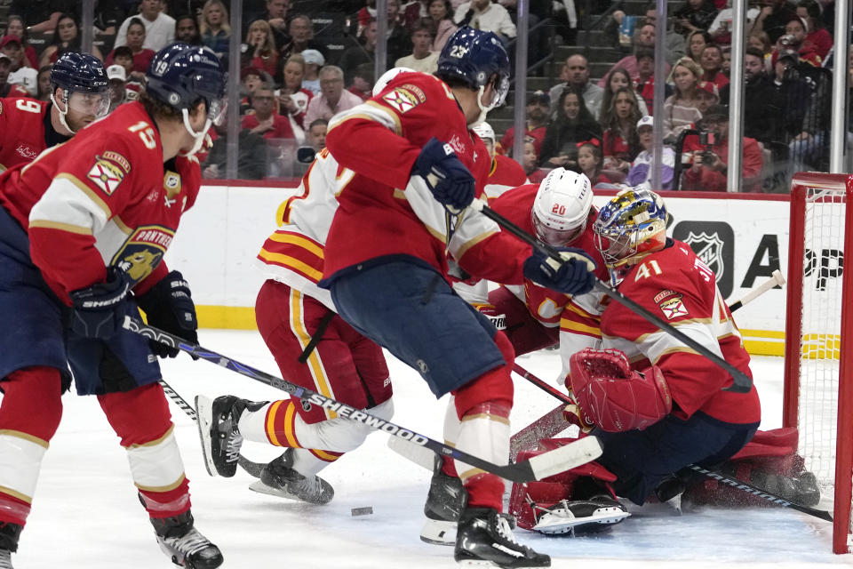Florida Panthers goaltender Anthony Stolarz (41) defends the goal during the first period of an NHL hockey game against the Calgary Flames, Saturday, March 9, 2024, in Sunrise, Fla. (AP Photo/Lynne Sladky)