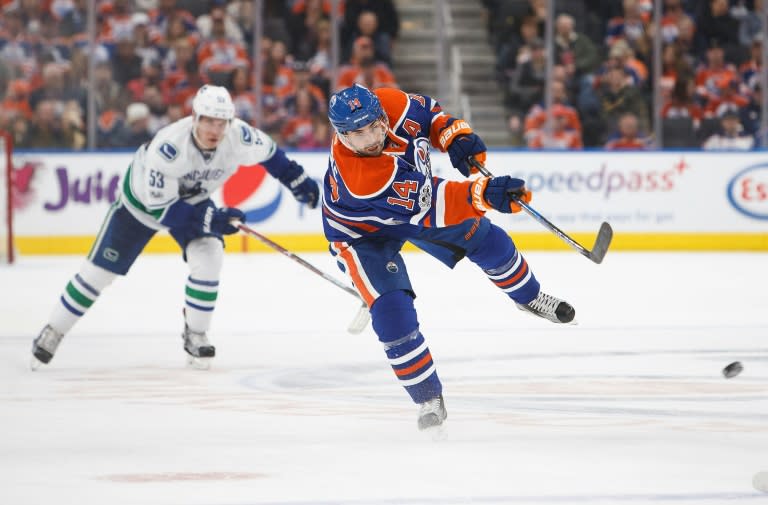 Jordan Eberle of the Edmonton Oilers takes a shot against the Vancouver Canucks, at Rogers Place in Edmonton, Alberta, on April 9, 2017