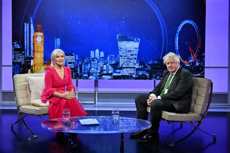 Former culture secretary Nadine Dorries interviewing former prime minister Boris Johnson on the first episode of Friday Night with Nadine (TalkTV/PA) (PA Media)