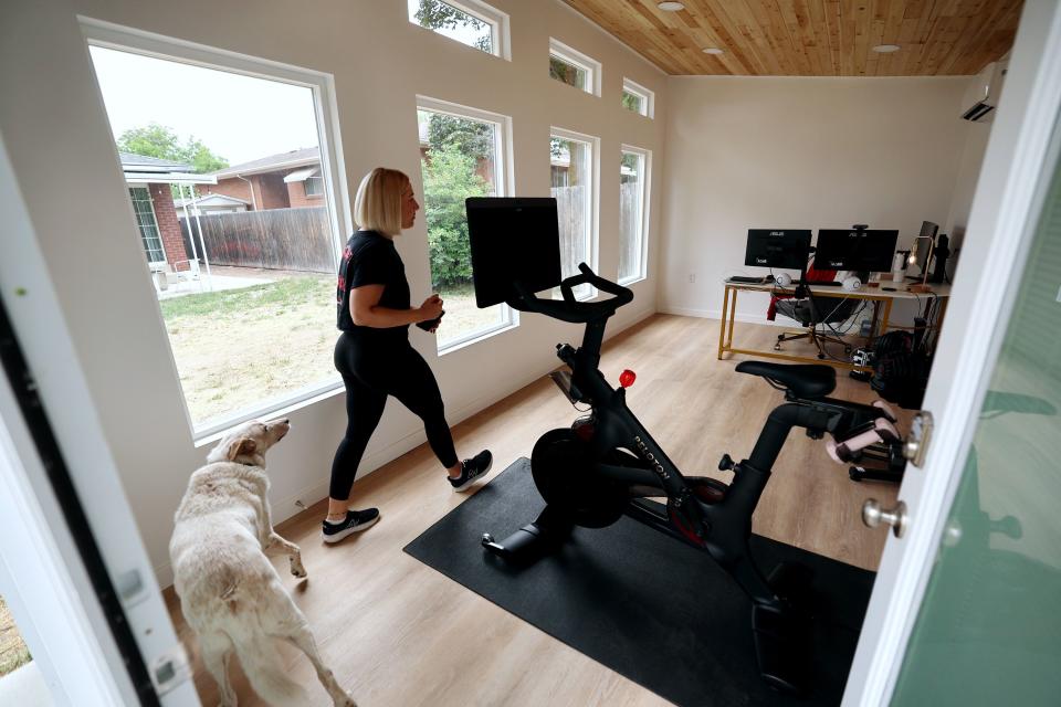 Homeowner Sydney Jones walks into her newly completed office space in her back yard. Jonathan Hitzhusen, owner of Backyard Office Utah, talked about the small business and how it got started on Tuesday, June 20, 2023, in Midvale. | Scott G Winterton, Deseret News