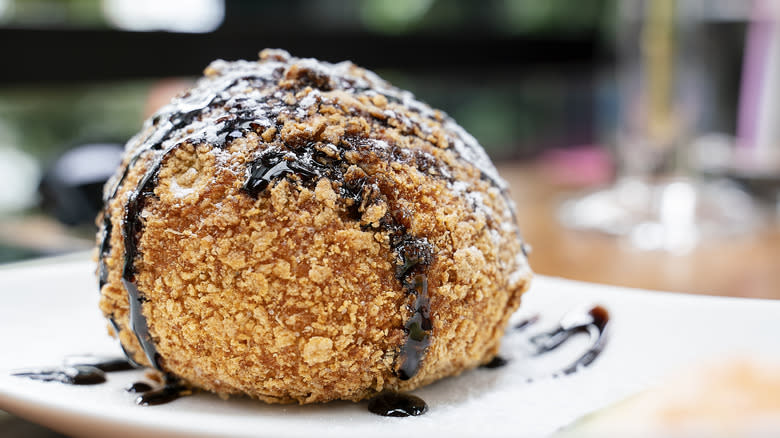 Fried ice cream with chocolate syrup