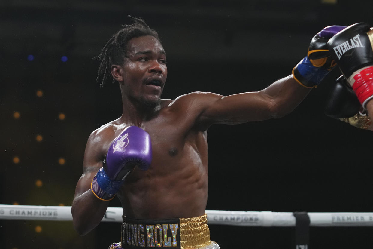 ATLANTIC CITY, NJ - JANUARY 22: Evan Holyfield (L) fights Chris Rollins (R) at the Borgata Hotel Casino & Spa on January 22, 2022 in Atlantic City, United States. (Photo by Mitchell Leff/Getty Images)