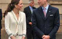 <p>Kate looked ready to hit the tennis courts in her traditional cream knit dress by Alexander McQueen and navy Prada shoes.</p>