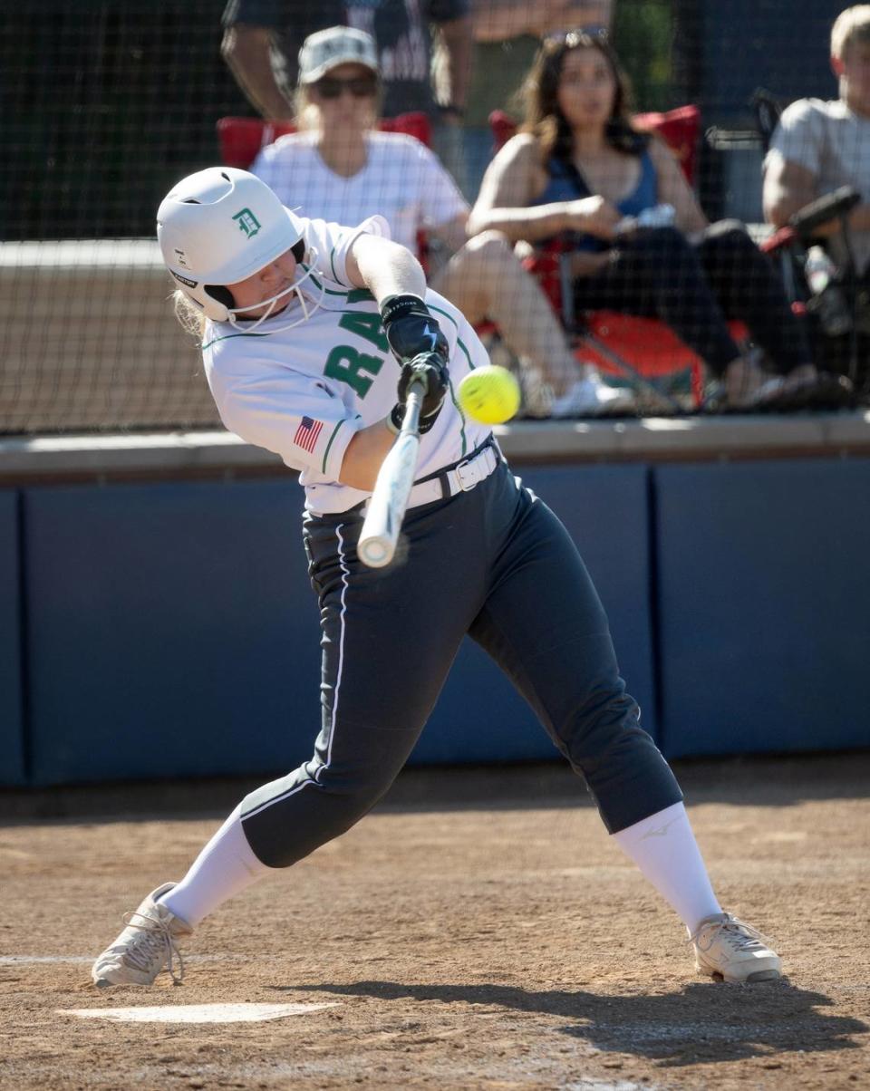 Dixon’s Caitlyn Hendershot connects for a home rum during the Sac-Joaquin Section D IV softball championship game with Central Catholic at Cosumnes River College in Sacramento, Calif., Saturday, May 25, 2024. Dixon won the game 7-6.