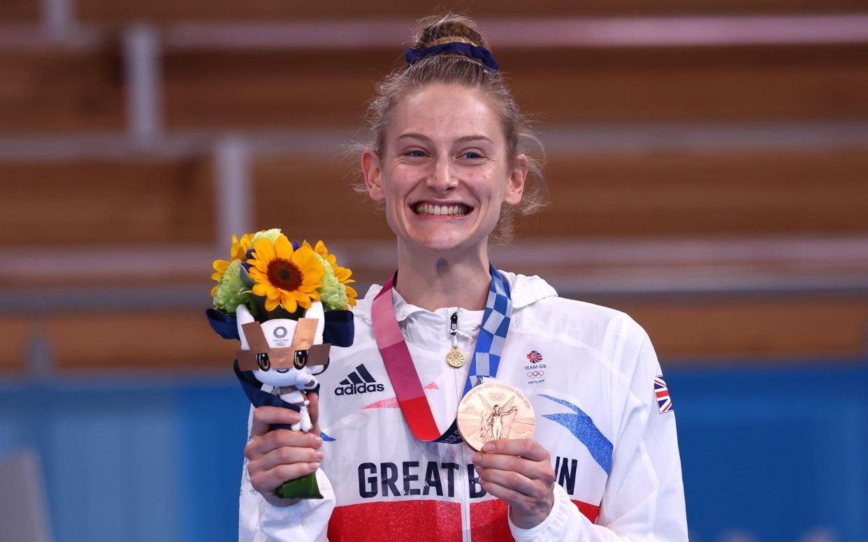 Bryony Page poses with her medal - REUTERS