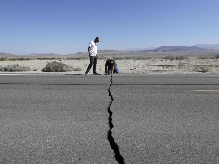 Up to 30,000 aftershocks could hit California in the next six months after the US state was hit by two major earthquakes in 48 hours last week, seismologists have warned. They were part of a continuing sequence of tremors that would affect the area for months, said Lucy Jones, of the California Institute of Technology and said the earthquakes. The region could see more than 30,000 minor earthquakes over six months, with one or two magnitude 6 quakes expected, her colleague and fellow seismologist Egill Hauksson, added. Up to 190 magnitude 3 earthquakes could take place over the next week alone, with a 12 per cent probability of a magnitude 6 earthquake, according to the US Geological Survey (USGS).Magnitude 3 earthquakes are big enough to be felt and any earthquake over magnitude 4 is big enough to cause damage to buildings.“It is a wake-up call for the rest of the state and other parts of the nation, frankly,” California Governor Gavin Newsom said, voicing concerns about the possibility of major aftershocks in the months to come. He said that residents should make sure they know how to respond if more natural disasters strike.Friday’s evening's earthquake was the largest one Southern California in nearly 20 years. Centred 11 miles from Ridgecrest, a small town with around 28,000 residents it struck the same area of the desert where a 6.4-magnitude temblor hit on ThursdayThe earthquake was felt by millions across an area ranging from Sacramento, the state capital in the north, to Mexico and including the Las Vegas and Los Angeles counties.It came off the back of hundreds of “foreshocks” that rattled the region late last month. Those left behind cracked and burning buildings, broken roads, obstructed railroad tracks and leaking water and gas lines and prompted the evacuation of the US Navy’s largest single landholding, the Naval Air Weapons Station China Lake in the Mohave Desert.Only a few injuries were reported, but two houses were reported to have caught fire from broken gas pipes; water gushed from zigzagged cracks in the busted pavement; and deep fissures were seen snaking across the Mojave Desert.In Ridgecrest, local fire and police officials said they were initially swamped by calls for medical and ambulance service.But police Chief Jed McLaughlin said there was “nothing but minor injuries such as cuts and bruises, by the grace of God.”In Trona, a town of about 2,000 people considered the gateway to Death Valley, fire officials said up to 50 structures were damaged. San Bernardino County Supervisor Robert Lovingood said the US Federal Emergency Management Agency (FEMA) delivered a tractor-trailer full of bottled water because of damage to water lines. Newsom declared a state of emergency for the county. The USGS has issued a red alert for economic losses, meaning that extensive damage is probable and that the disaster is likely widespread. Estimated economic losses are at least $1 billion dollars.“Past events with this alert level have required a national or international level response,” the USGS said in its assessment.Mr Newsom estimated more than $100m (£79m) in economic damages and said President Donald Trump called him to offer federal support in the rebuilding effort.“He’s committed in the long haul, the long run, to help support the rebuilding efforts,” Mr Newsom, a Democrat, said of his leader. “There’s no question we don’t agree on everything, but one area where there’s no politics, where we work extremely well together, is our response to emergencies,” he added. The USGS said the aftershock activity is decreasing faster than average. Aftershocks are minor earthquakes that take place as the displaced crust adjusts to the effects of the main earthquake. It is normal for aftershocks to take place for weeks after a major shock, although their number decreases over time. A large aftershock can temporarily increase the numbers again.With aftershocks expected and temperatures forecast to reach 38 Celsius over the next several days, officials were taking precautions.The California National Guard sent 200 troops, logistical support and aircraft. Major General David Baldwin said the Pentagon had been notified and the entire California Military Department was put on alert. The California Office of Emergency Services also brought in cots, water and meals and set up cooling centres in the region. Additional reporting by Associated Press