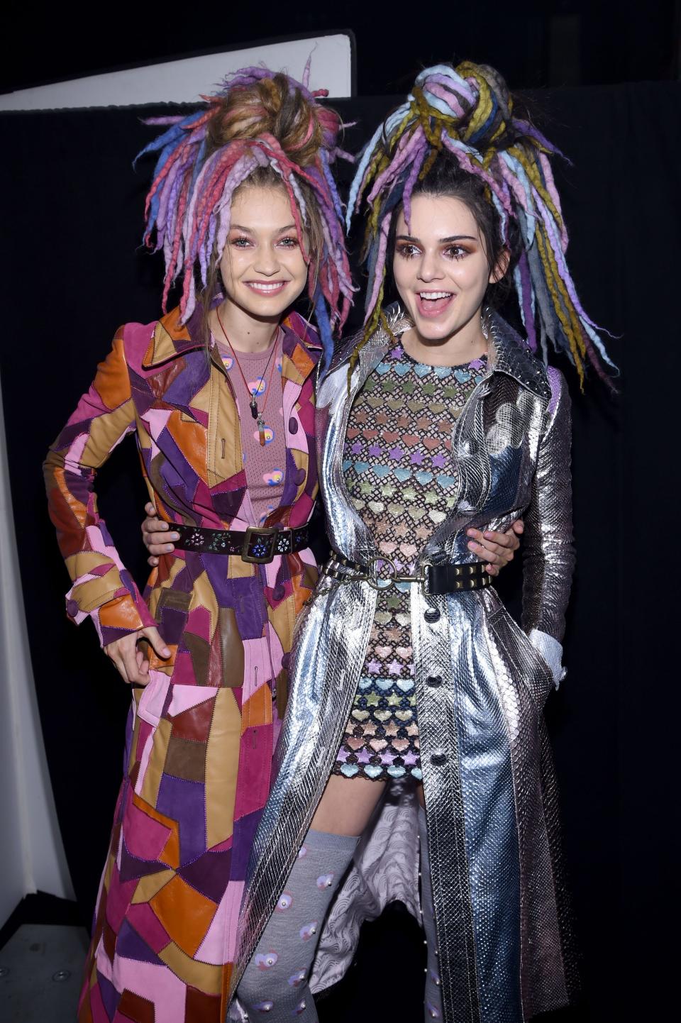 Gigi Hadid and Kendall Jenner wear rainbow dreadlocks during the Marc Jacobs Spring 2017 fashion show during New York Fashion Week on September 15, 2016.