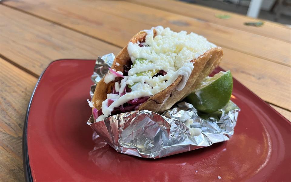 Taking tacos to the next level, Locos Food Truck offers the Tinga Taco.