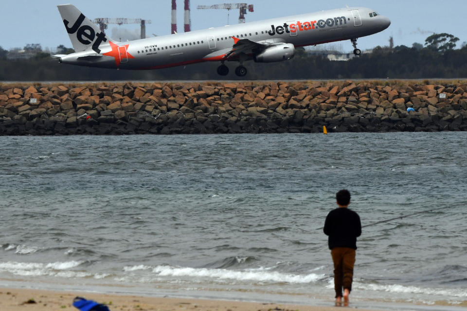 SYDNEY, AUSTRALIA - DECEMBER 12: A Jetstar aircraft departs at Sydney airport on December 12, 2019 in Sydney, Australia. Jetstar has cancelled 108 upcoming flights between Friday and Sunday in preparation for pilots and ground staff to walk off the job for four hours on Saturday and Sunday amid stalled wage negotiations. (Photo by Sam Mooy/Getty Images)