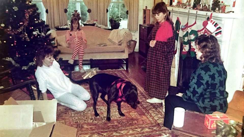 A Brown family Christmas in the 1980s with the original stockings hung in the back. - Courtesy Madeline Holcombe