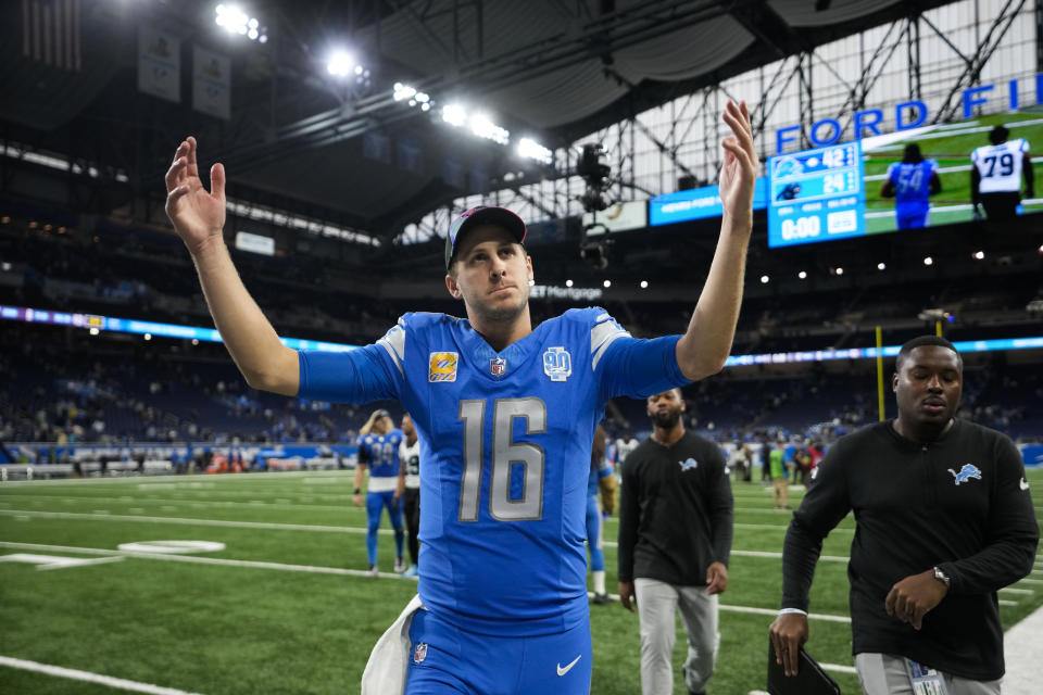 Detroit Lions quarterback Jared Goff (16) responds to the crowd as he walks off the field after an NFL football game against the Carolina Panthers in Detroit, Sunday, Oct. 8, 2023. The Lions won 42-24. (AP Photo/Paul Sancya)