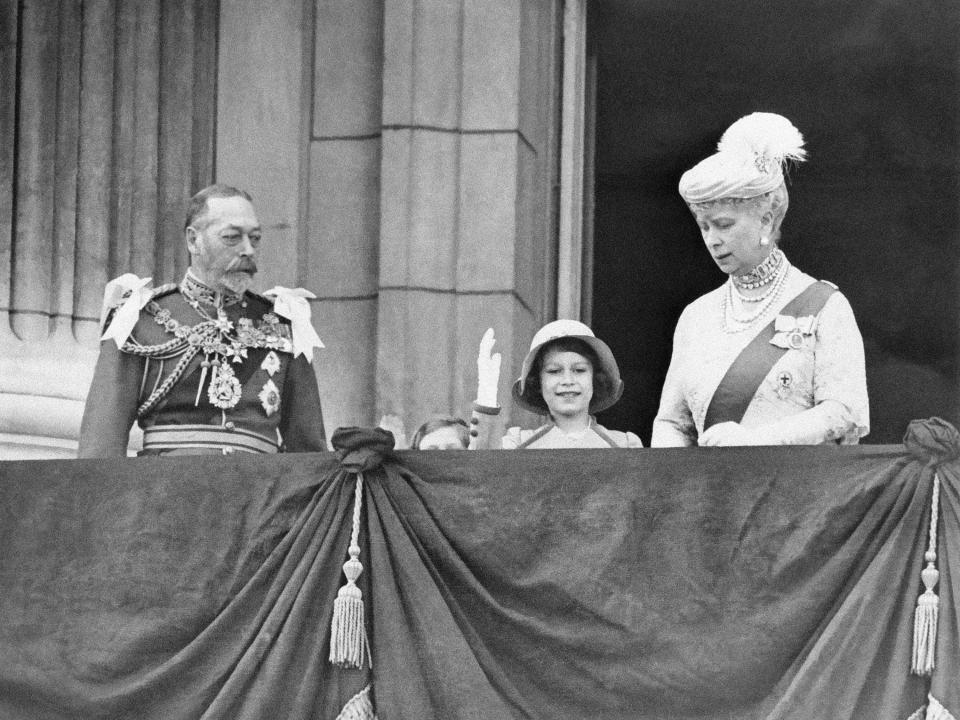 Queen Elizabeth, King George V, and Queen Mary on the balcony of Buckingham Palace in 1935.