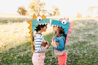 <p>This version of a dinosaur box costume leaves lots of open space for faces and room for arms to maneuver. (There's also <a href="https://minimadthings.com/blogs/news/dinosaur-costume" rel="nofollow noopener" target="_blank" data-ylk="slk:this option;elm:context_link;itc:0;sec:content-canvas" class="link ">this option</a> for toddlers who want to go all-in.)</p><p><em><a href="https://minimadthings.com/collections/e-books/products/unboxed-adventures-in-cardboard-book" rel="nofollow noopener" target="_blank" data-ylk="slk:Get the tutorial at Mini Mad Things »;elm:context_link;itc:0;sec:content-canvas" class="link ">Get the tutorial at Mini Mad Things »</a> </em></p>