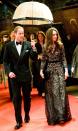 <p>This bubble umbrella was not sufficient to protect both the Duke and Duchess during the U.K. premiere of <em>War Horse.</em><br></p>