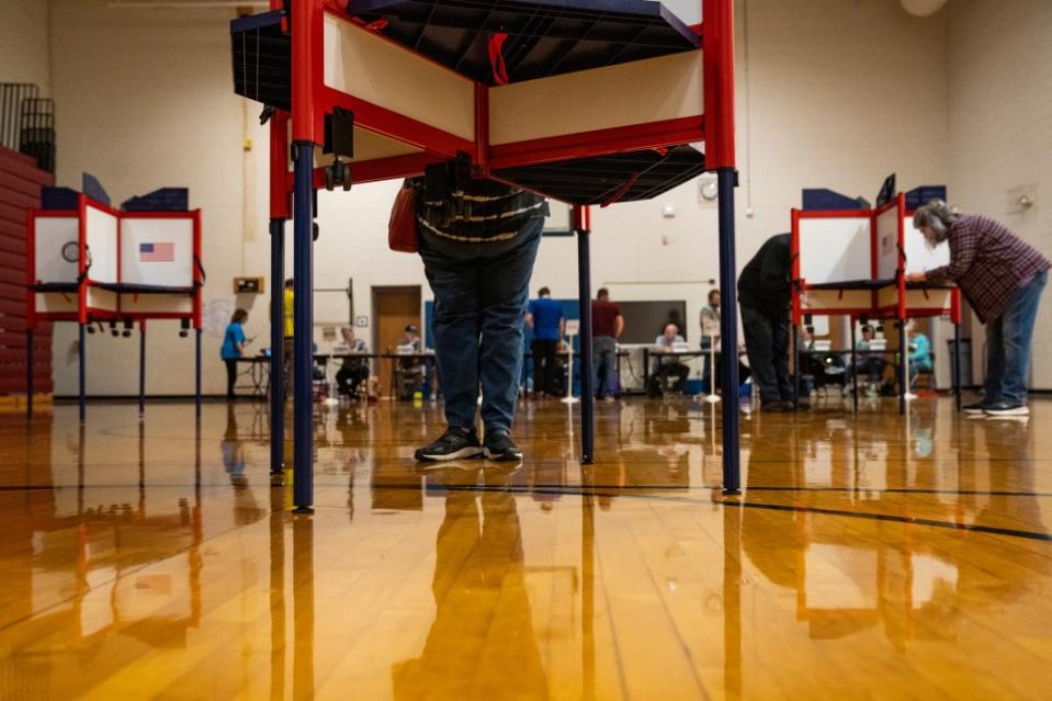 Voters cast their ballots in the Kentucky gubernatorial race at the Shelby Traditional Academy on November 7, 2023, in Louisville, Kentucky. (Photo by Michael Swensen/Getty Images)