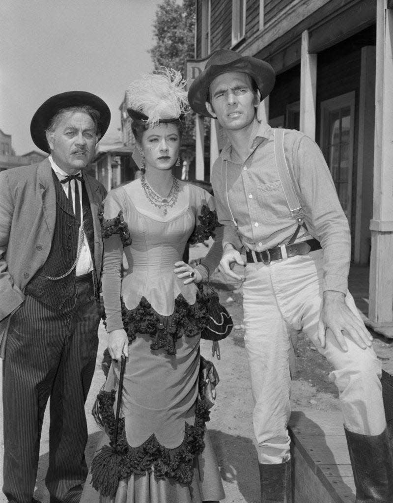 Milburn Stone, Amanda Blake and Dennis Weaver starred in "Gunsmoke."