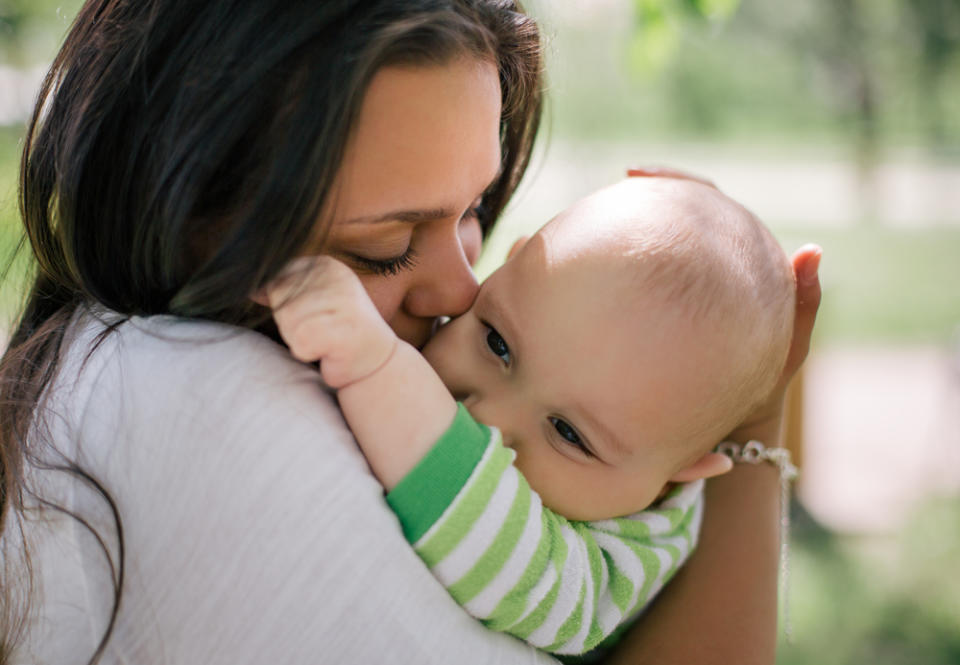 How do you know your baby loves you back? Here are a few sweet, surprising ways she shows it, starting with those first few weeks all the way through the toddler years.