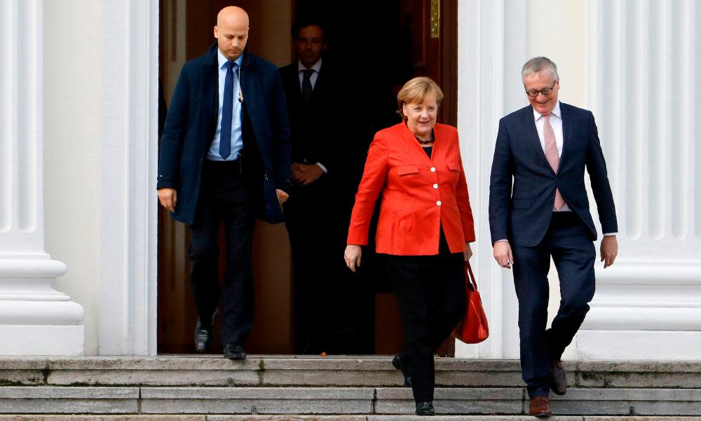 Angela Merkel leaves a meeting with the German president on Monday following the collapse of coalition talks.