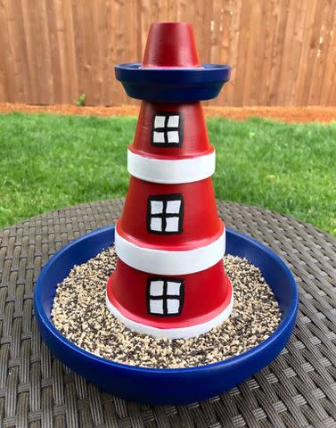 <p><a href="https://modpodgerocksblog.com/clay-pot-lighthouse/" data-component="link" data-source="inlineLink" data-type="externalLink" data-ordinal="1">Mod Podge Rocks</a></p>