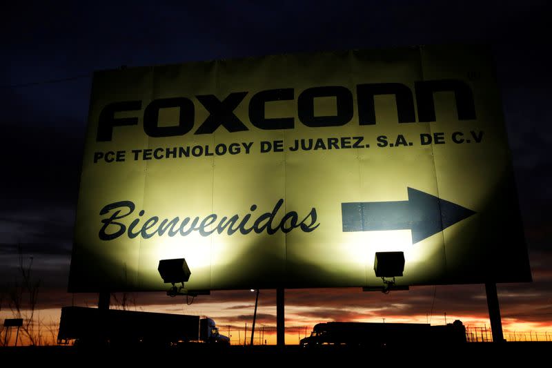 FILE PHOTO: A sign announces the manufacturing complex of Foxconn PCE Technology, in Ciudad Juarez